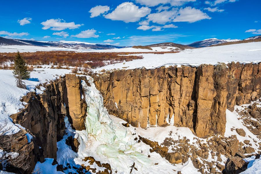 Make sure everyone dresses warmly when you’re snowshoeing or hiking to North Clear Creek Falls near Lake City, Colorado