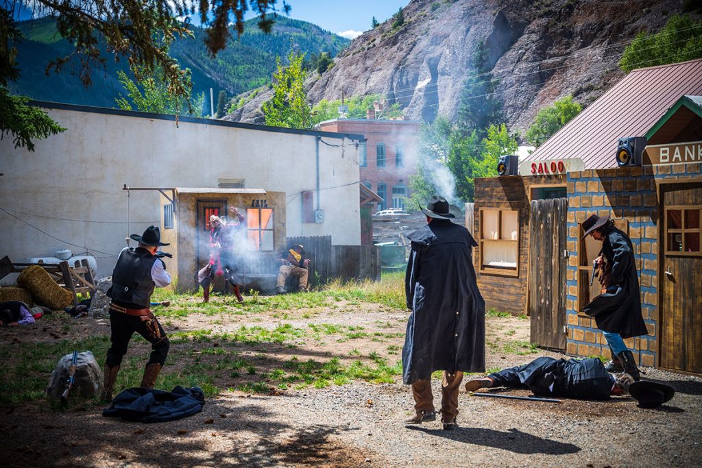 A gunfight reenactment with old west and local legends happens on summer Saturdays in Lake City