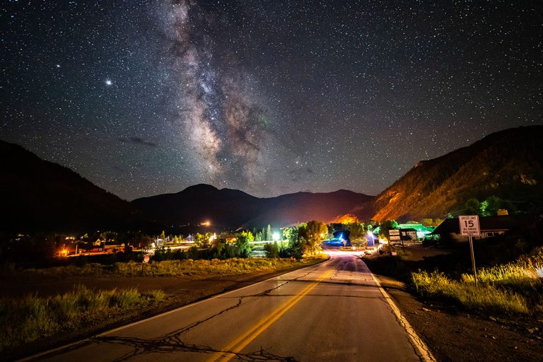 The Milky Way rises over the town of Lake City, Colorado